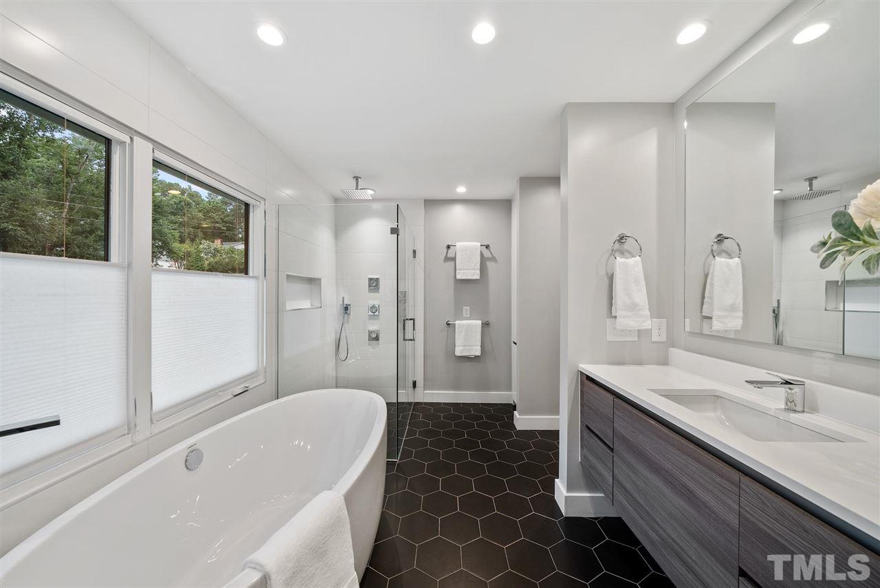 Hillman Real Estate Group's Modernist Home of the Month- 5406 Parkwood Drive Raleigh Bathroom with Tub